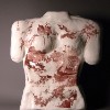 Female torso; press mold with white slip, decals, and clear glaze.